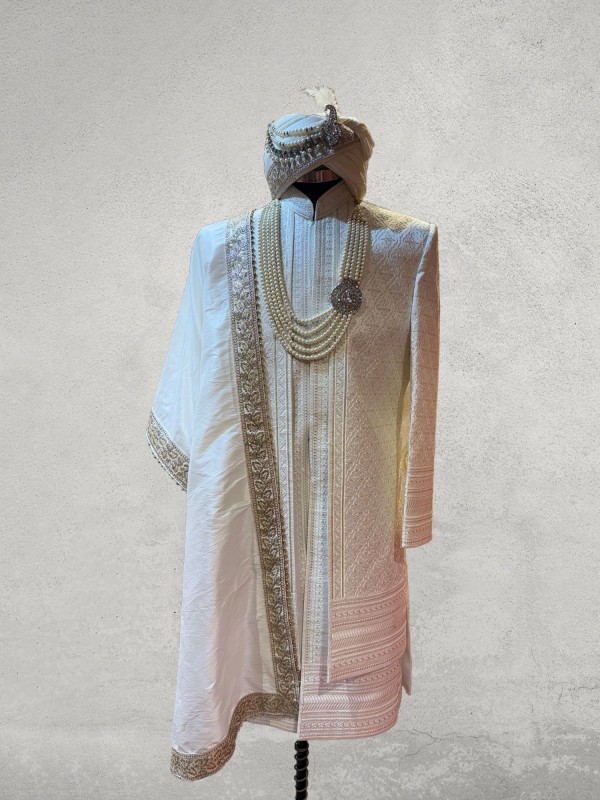 Sophisticated off white threadwork designer sherwani layered pattern
